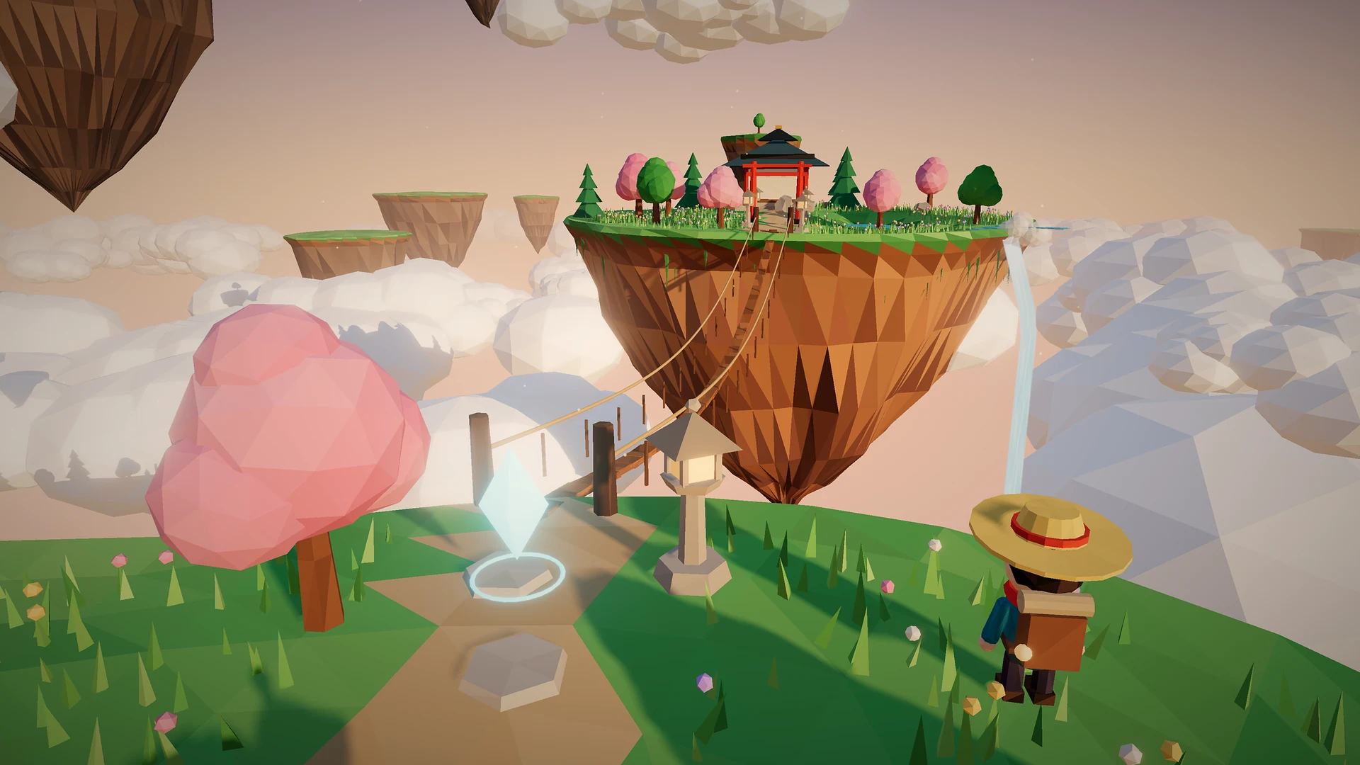 A small explorer in a straw hat stands on a grassy floating island, looking across a rope bridge to a second island with a red gate, a shrine and a waterfall, above a sea of clouds at golden hour